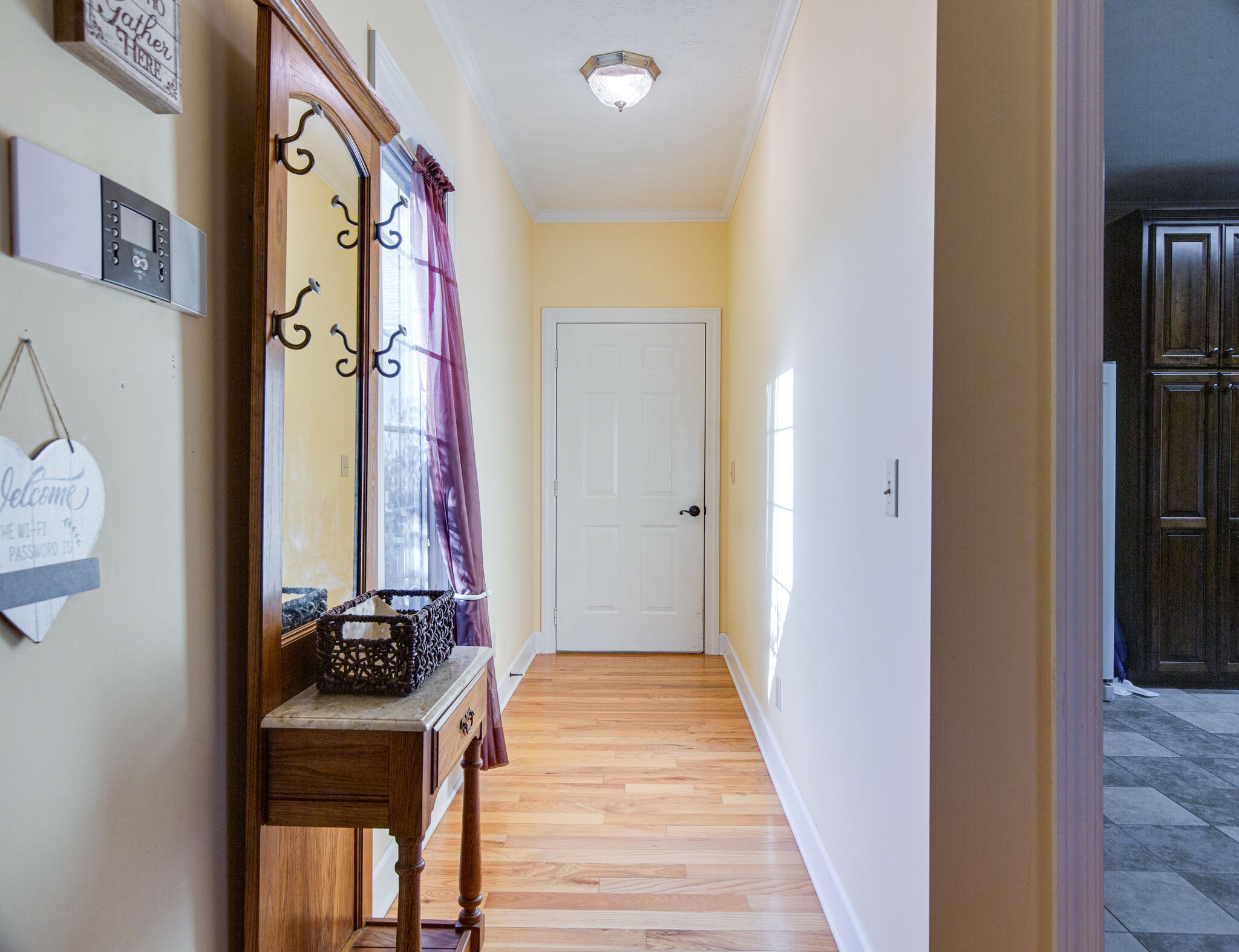 143 Sycamore Road Dickson, TN 37055 - Photo 16 of 36 a view of a hallway to a livingroom and a front door