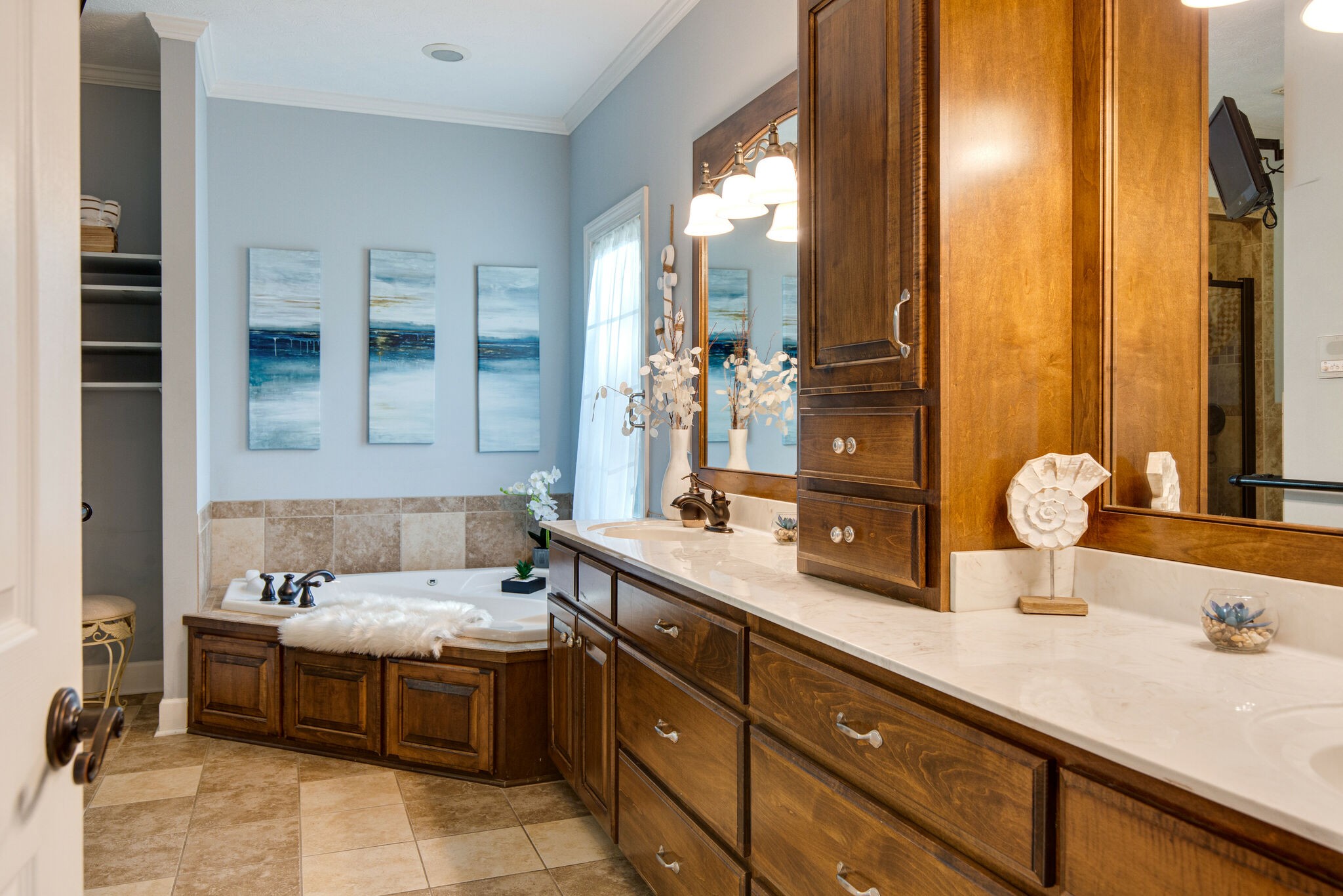 143 Sycamore Road Dickson, TN 37055 - Photo 20 of 36 a spacious bathroom with a granite countertop sink and a mirror