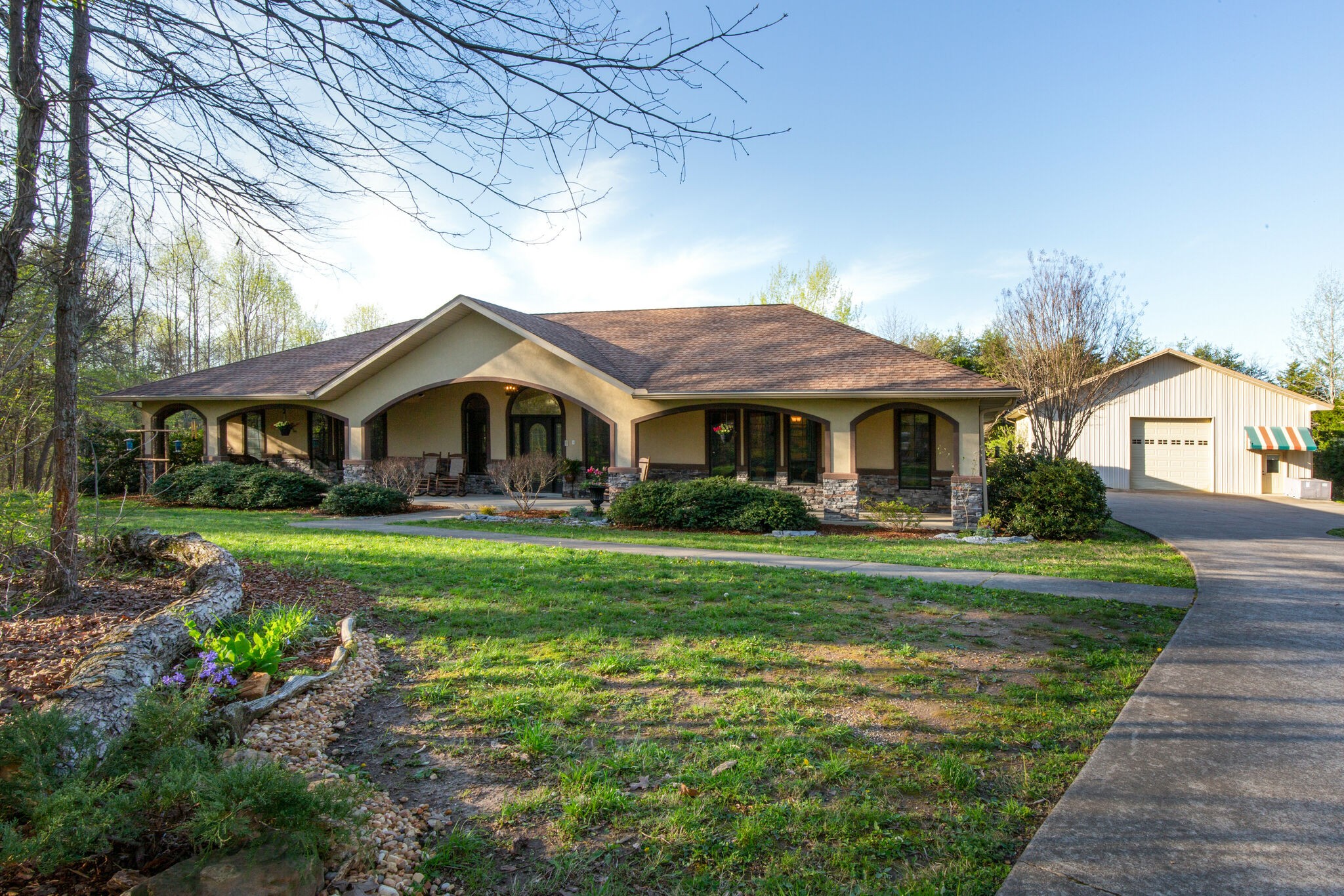143 Sycamore Road Dickson, TN 37055 - Photo 2 of 36 a front view of a house with a yard table and chairs