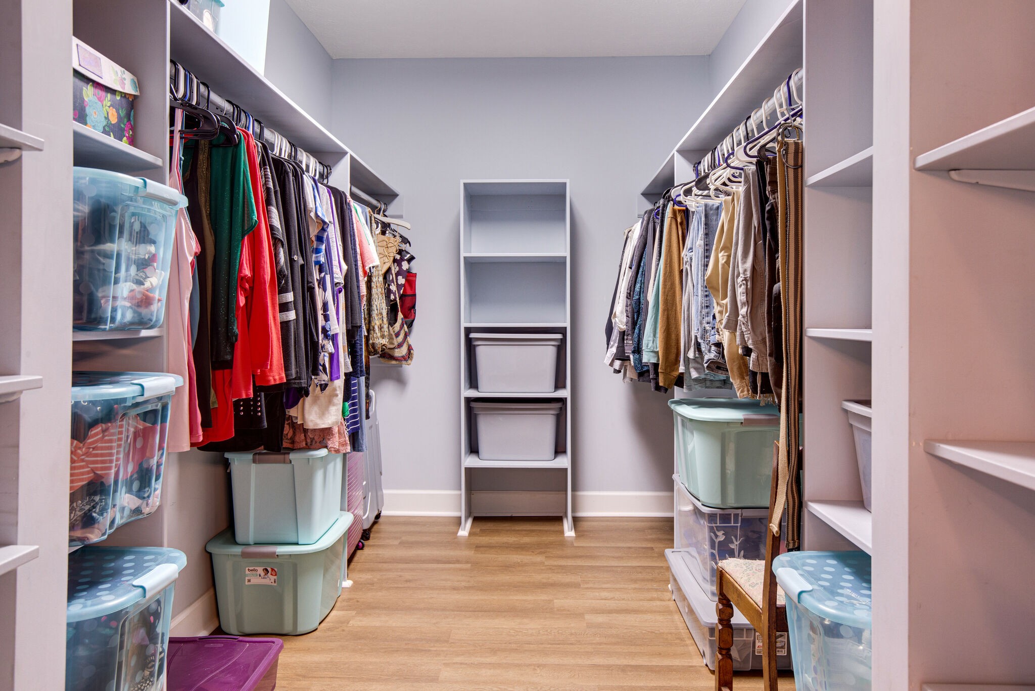 143 Sycamore Road Dickson, TN 37055 - Photo 22 of 36 a view of walk in closet with clothes and shoes
