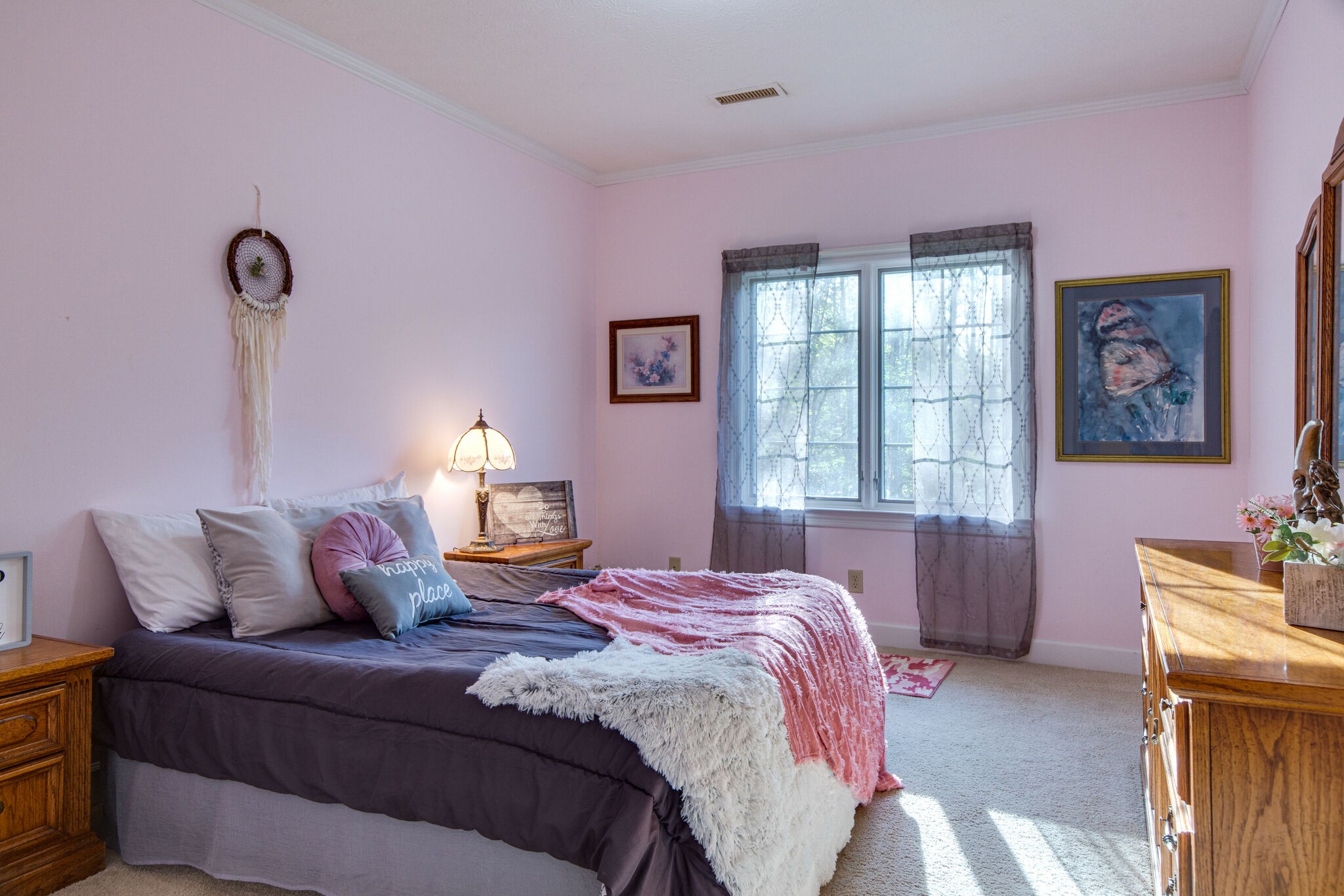 143 Sycamore Road Dickson, TN 37055 - Photo 23 of 36 a bedroom with a bed and wooden floor