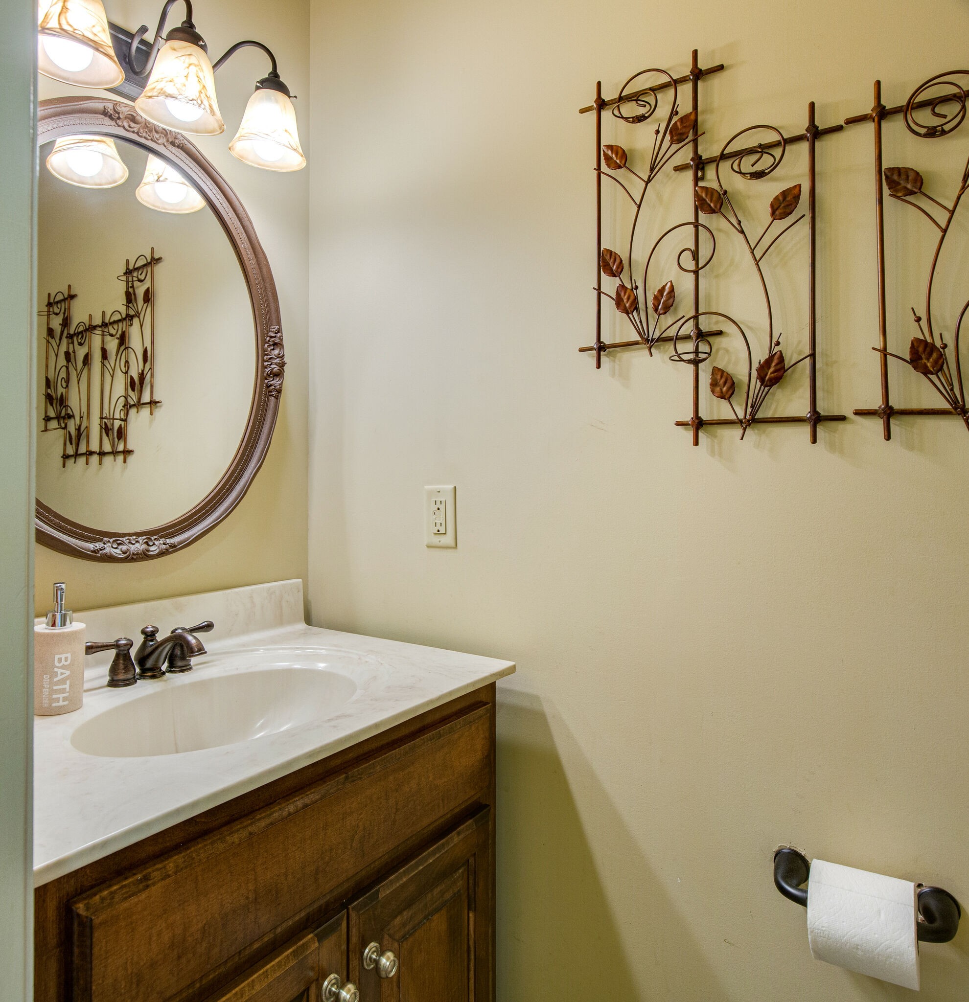 143 Sycamore Road Dickson, TN 37055 - Photo 26 of 36 a bathroom with a sink and a mirror