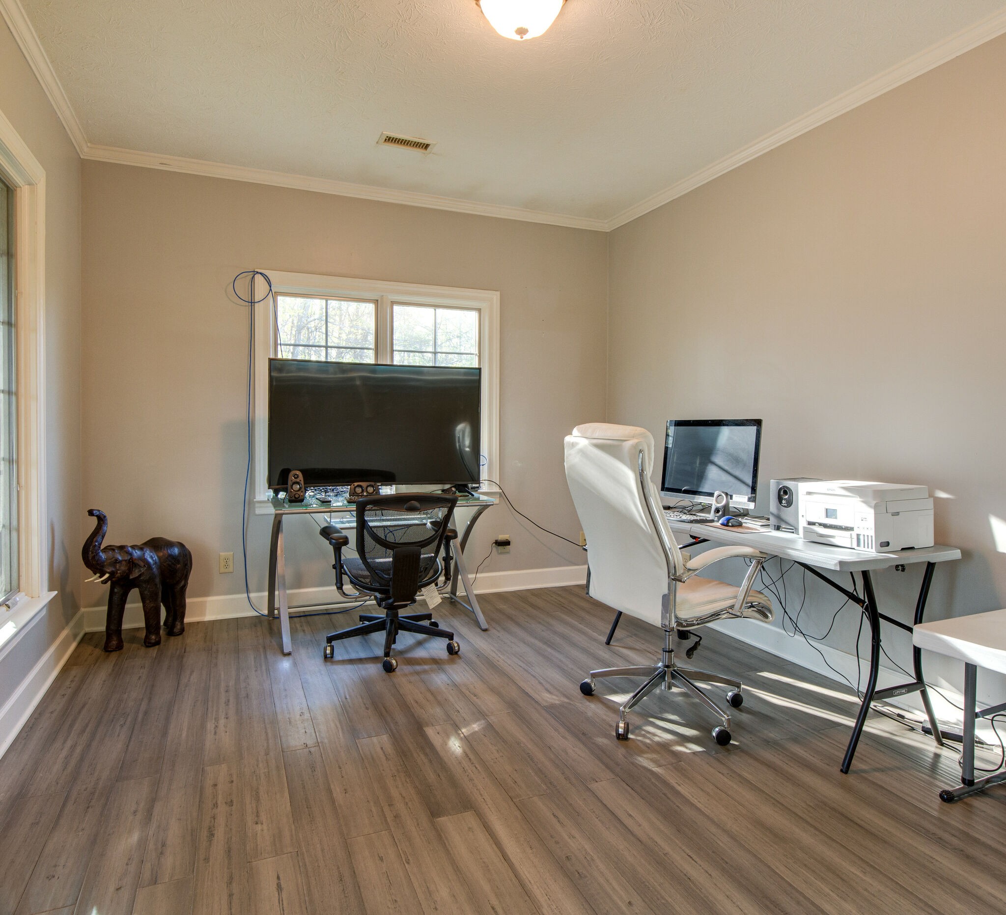 143 Sycamore Road Dickson, TN 37055 - Photo 27 of 36 a view of a workspace with furniture and a window