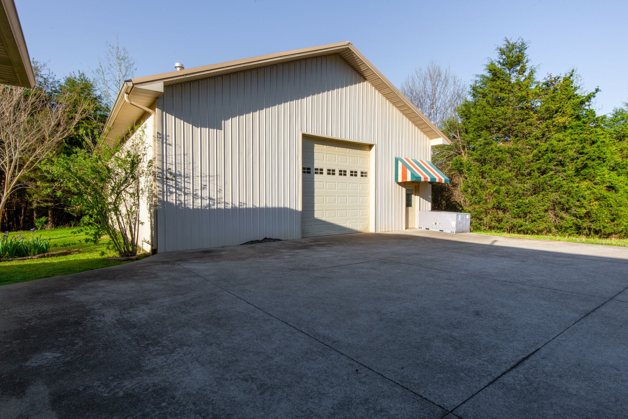 143 Sycamore Road Dickson, TN 37055 - Photo 34 of 36 a view of a house with a yard and garage