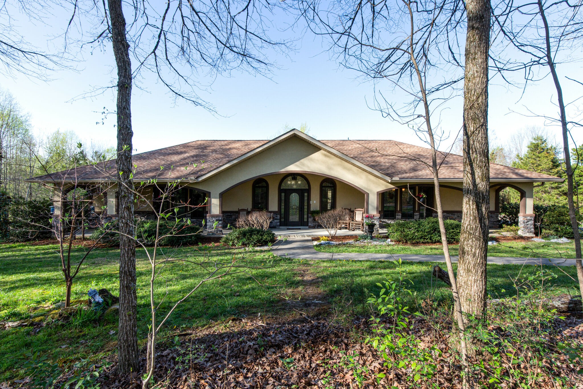 143 Sycamore Road Dickson, TN 37055 - Photo 6 of 36 a front view of a house with a yard table and chairs