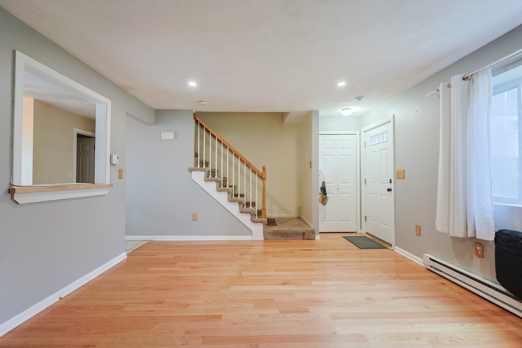 6 Erick Road, Unit 73 Mansfield, MA 02048 - Photo 7 of 21 a view of an entryway with a livingroom