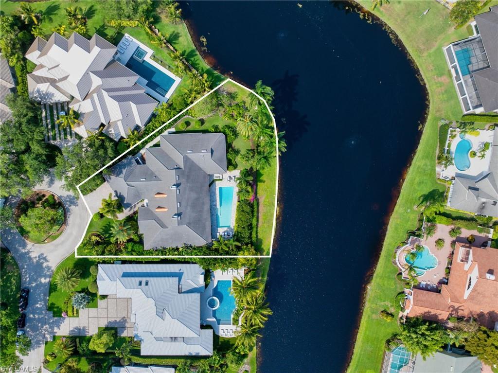 701 Tamarind Court Naples, FL 34108 - Photo 3 of 3 an aerial view of a house