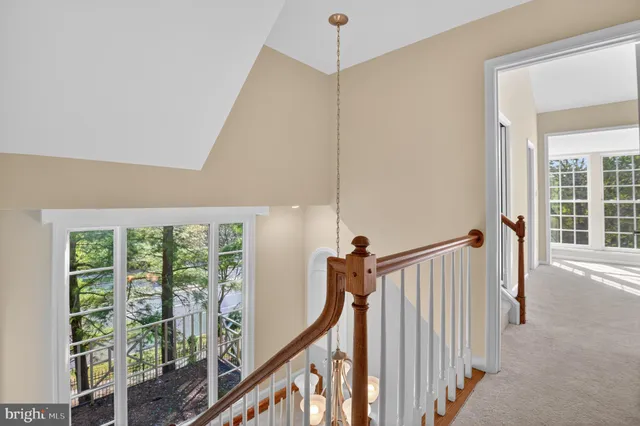 a bathroom with a toilet a sink and a mirror