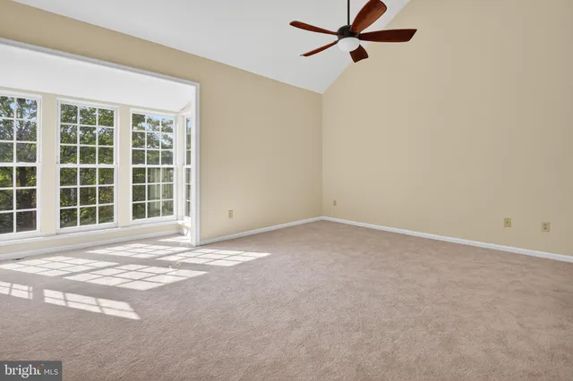 a bathroom with a sink a mirror and a shower