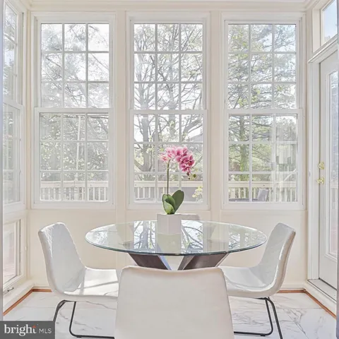 a view of a wooden fence and trees