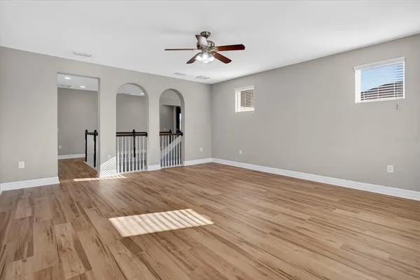 a view of an empty room with a large window