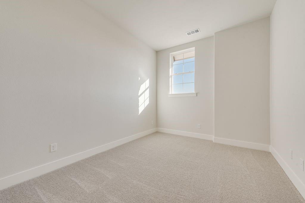 12703 Pine Ridge Trail Rowlett, TX 75089 - Photo 27 of 30 a view of an empty room with a window