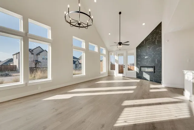 a view of an entryway with wooden floor