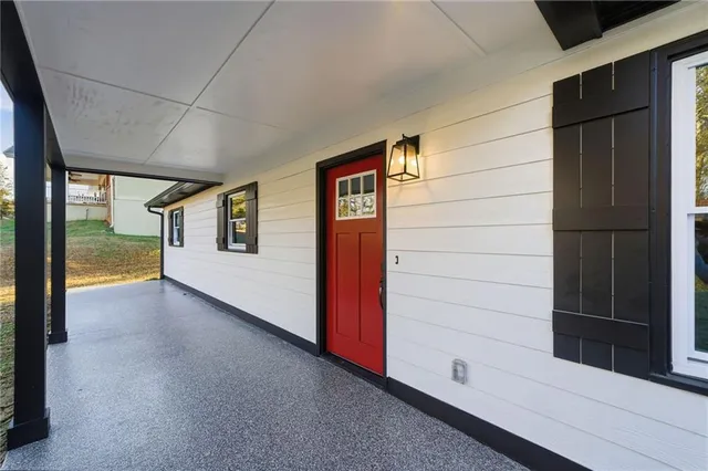 a view of an empty room and window