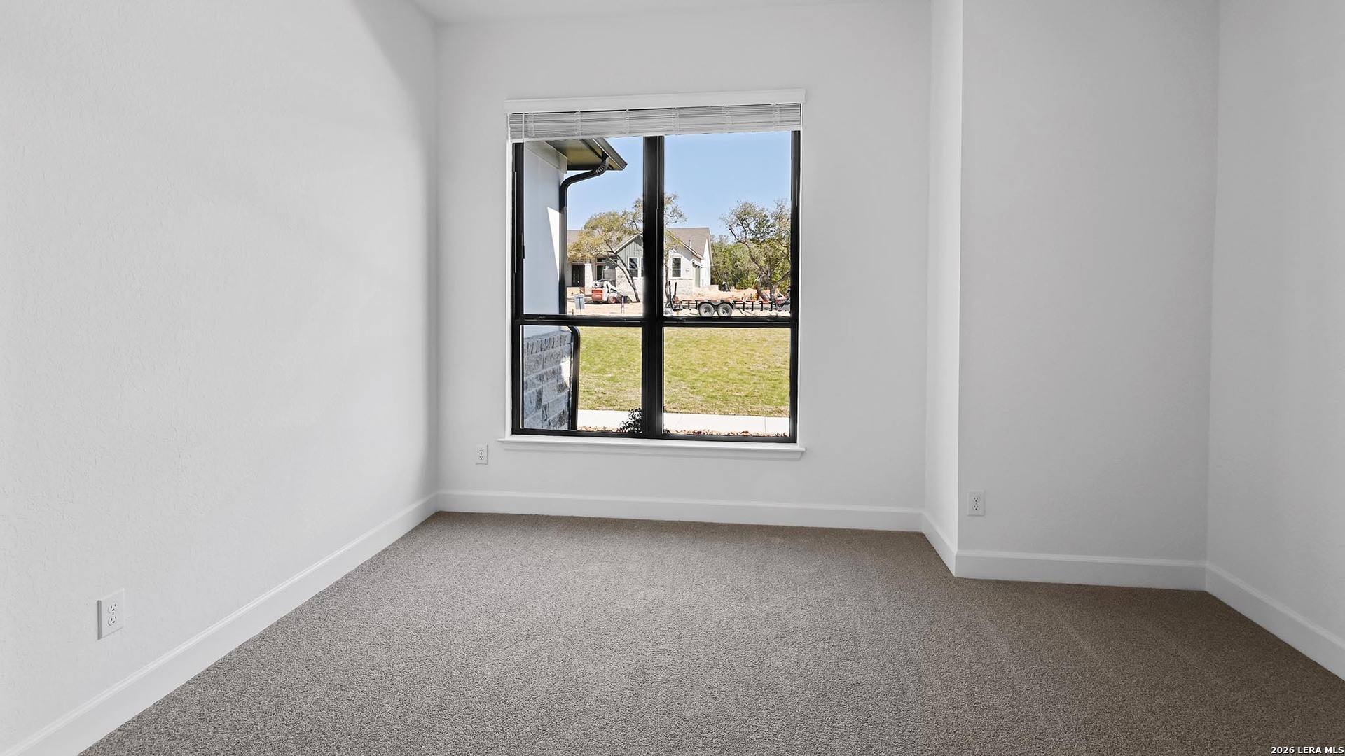 1006 Rapidan Lane Bulverde, TX 78163 - Photo 21 of 26 an empty room with a window