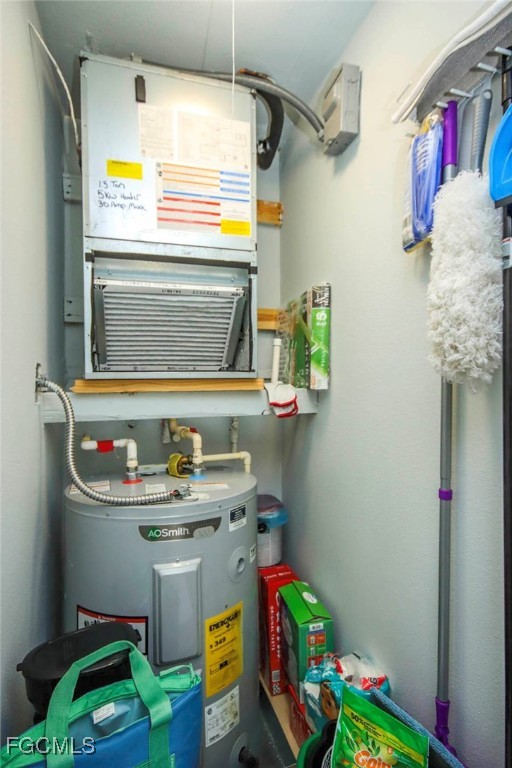 641 Periwinkle Way, Unit A3 Sanibel, FL 33957 - Photo 18 of 26 a utility room with dryer and washer
