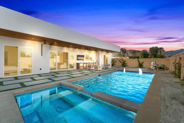 a view of a terrace with wooden fence