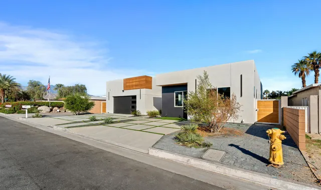 a house with yard in front of it