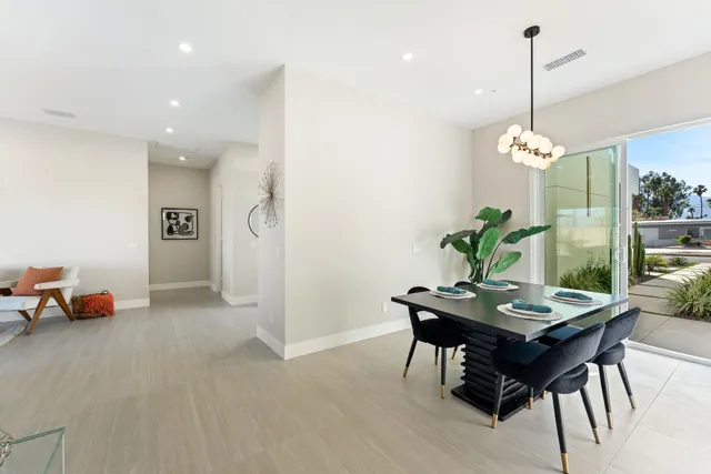 a view of a balcony with furniture