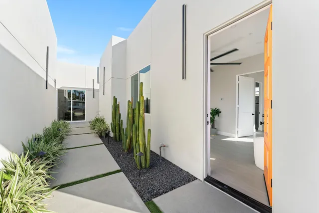 a kitchen with cabinets and stainless steel appliances