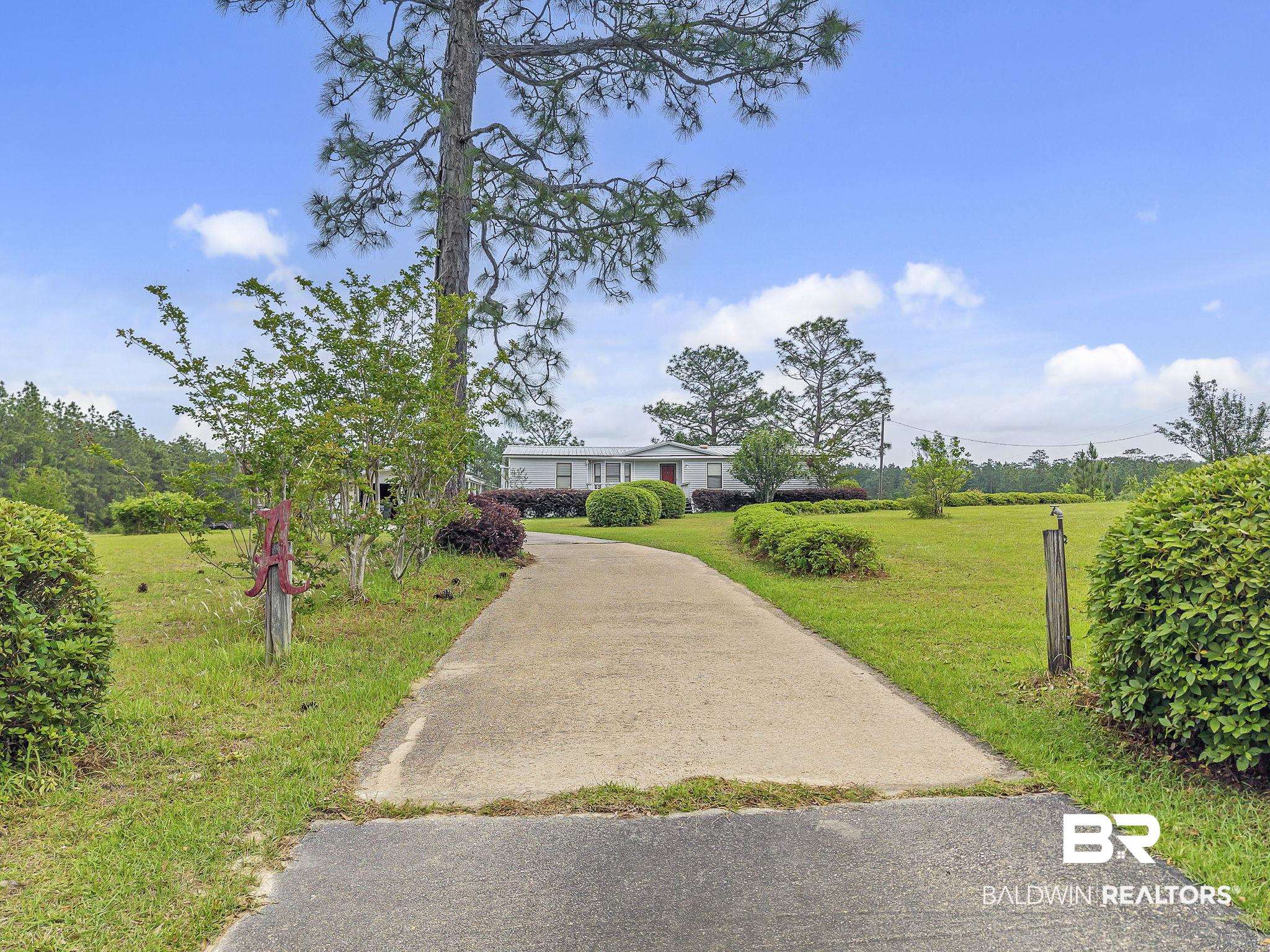 29792 County Road 65 Loxley, AL 36551 - Photo 35 of 39 Surrounding community with a yard