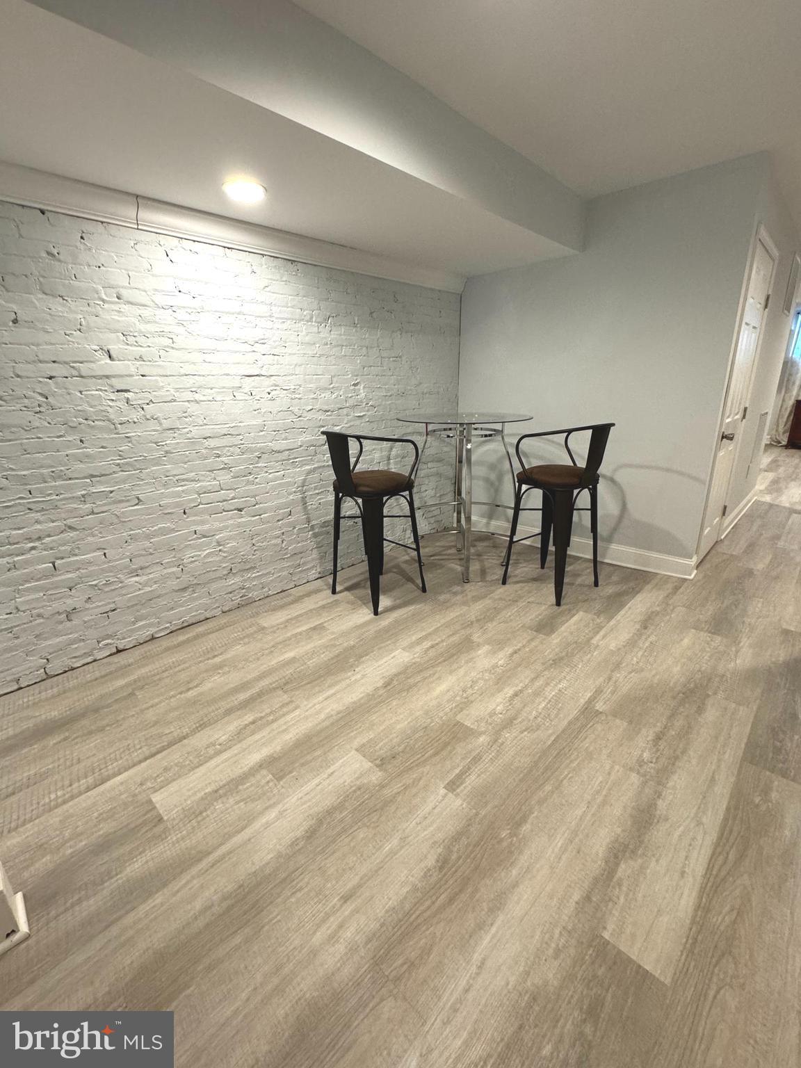 3208 Auchentoroly Terrace Baltimore, MD 21217 - Photo 16 of 25 a view of a room with table and chair