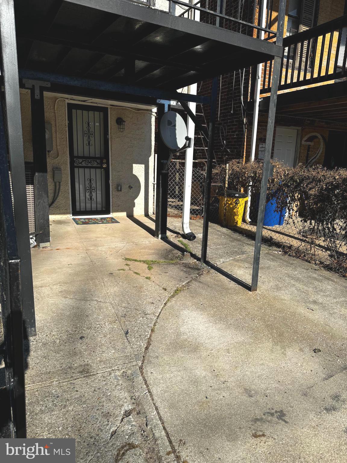 3208 Auchentoroly Terrace Baltimore, MD 21217 - Photo 2 of 25 a view of a house with glass door and glass door