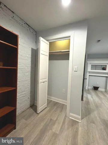 a view of livingroom with furniture and wooden floor