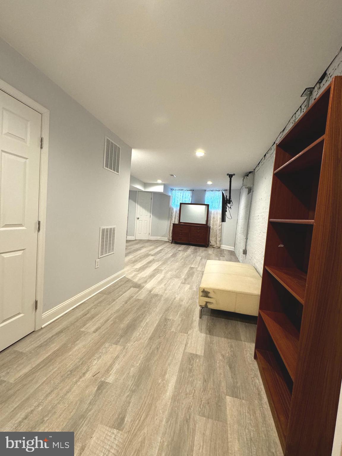 3208 Auchentoroly Terrace Baltimore, MD 21217 - Photo 22 of 25 a view of livingroom with furniture and wooden floor