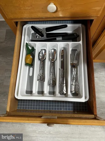 a kitchen with a stove and a microwave