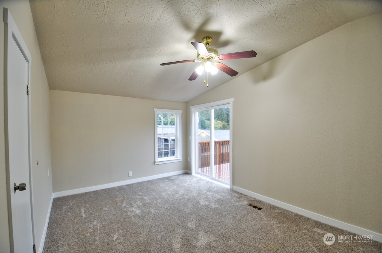 27 South Gee Creek Loop Ridgefield, WA 98642 - Photo 16 of 26 a view of an empty room with a window