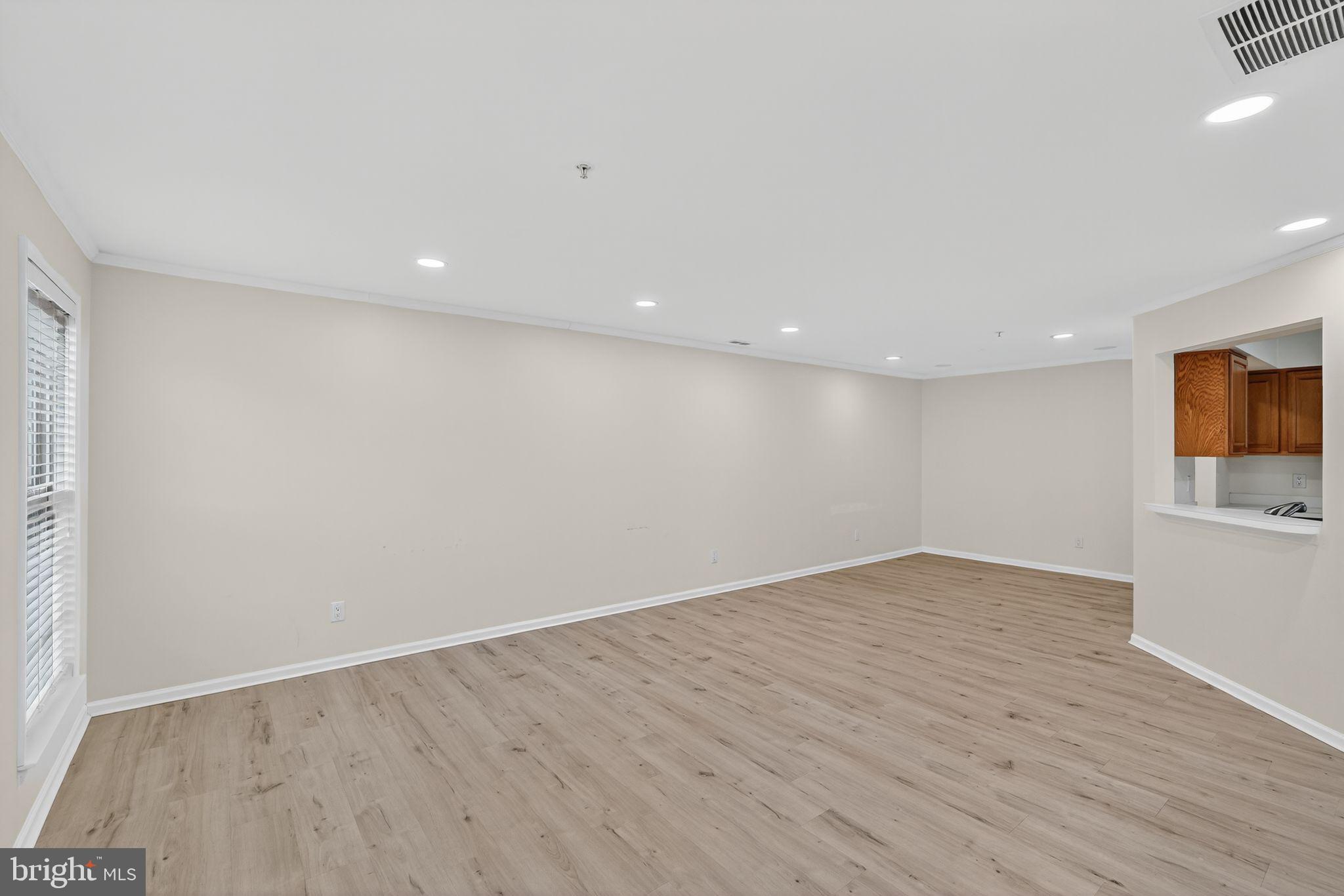 1404 Wharton Road Mount Laurel, NJ 08054 - Photo 11 of 30 wooden floor in an empty room with a window