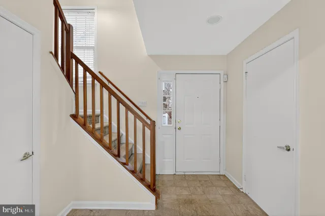 a view of an entryway with staircase