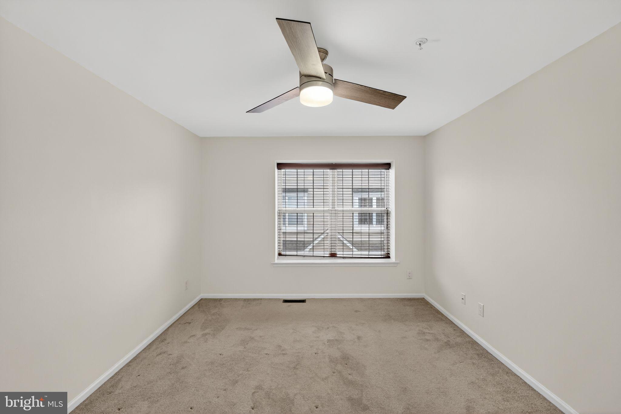 1404 Wharton Road Mount Laurel, NJ 08054 - Photo 16 of 30 an empty room with a window