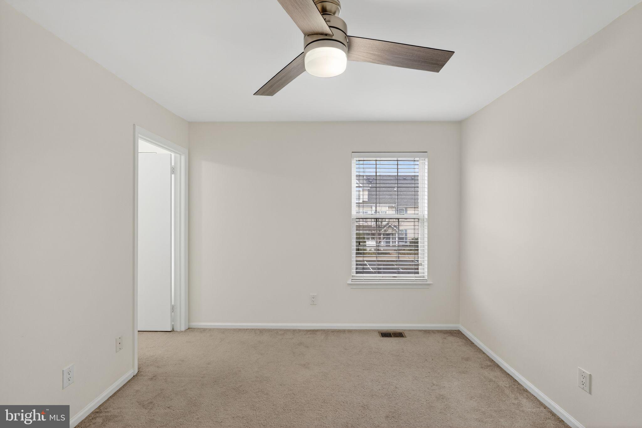 1404 Wharton Road Mount Laurel, NJ 08054 - Photo 17 of 30 a view of an empty room with a window