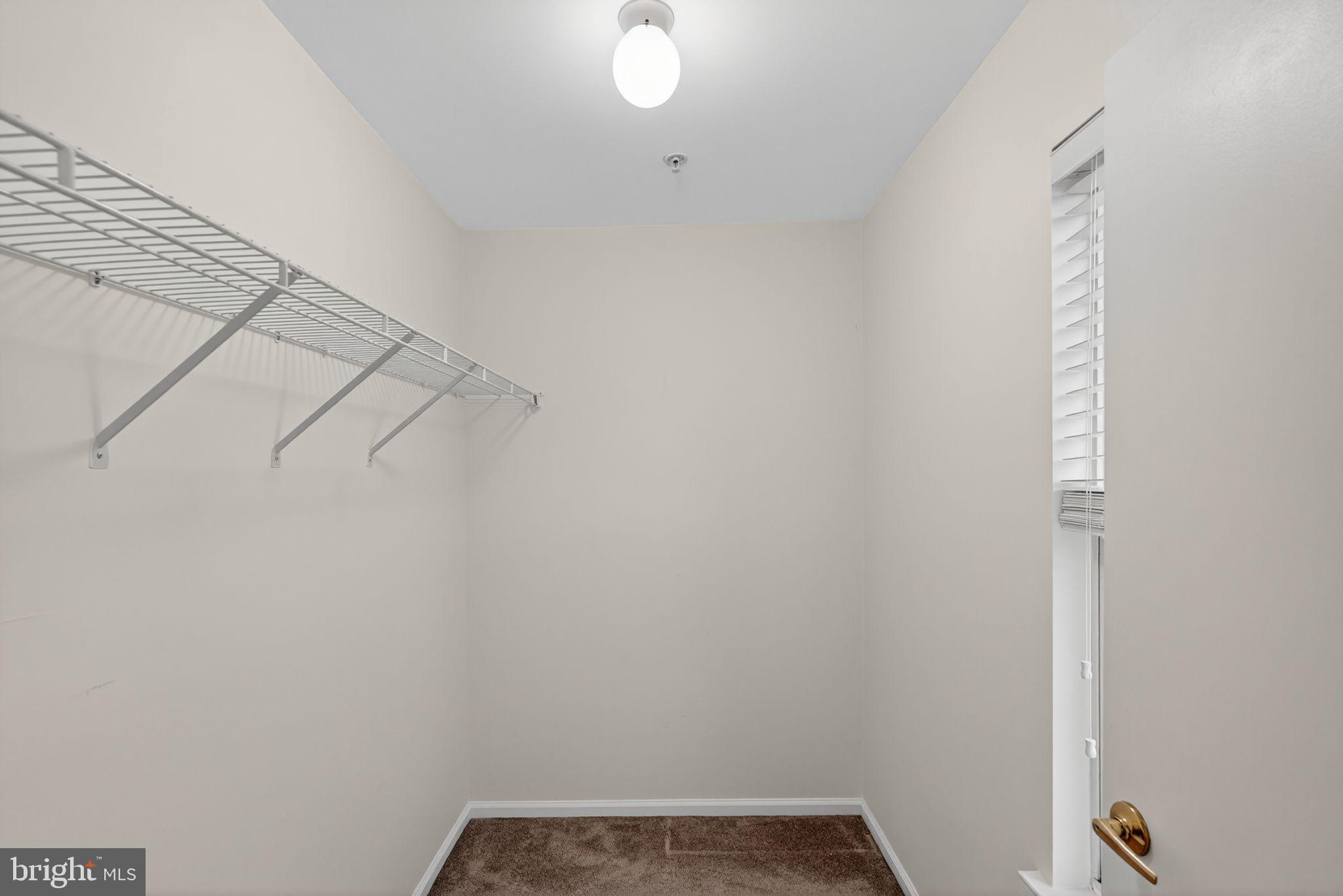 1404 Wharton Road Mount Laurel, NJ 08054 - Photo 21 of 30 a view of a room with racks on the wall