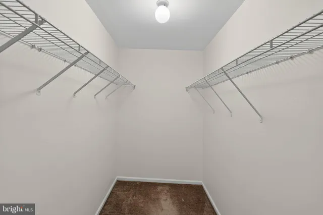 a view of a room with racks on the wall