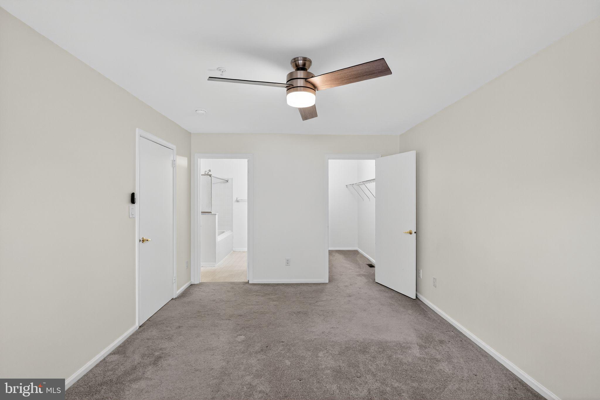 1404 Wharton Road Mount Laurel, NJ 08054 - Photo 24 of 30 a view of an empty room with a ceiling fan