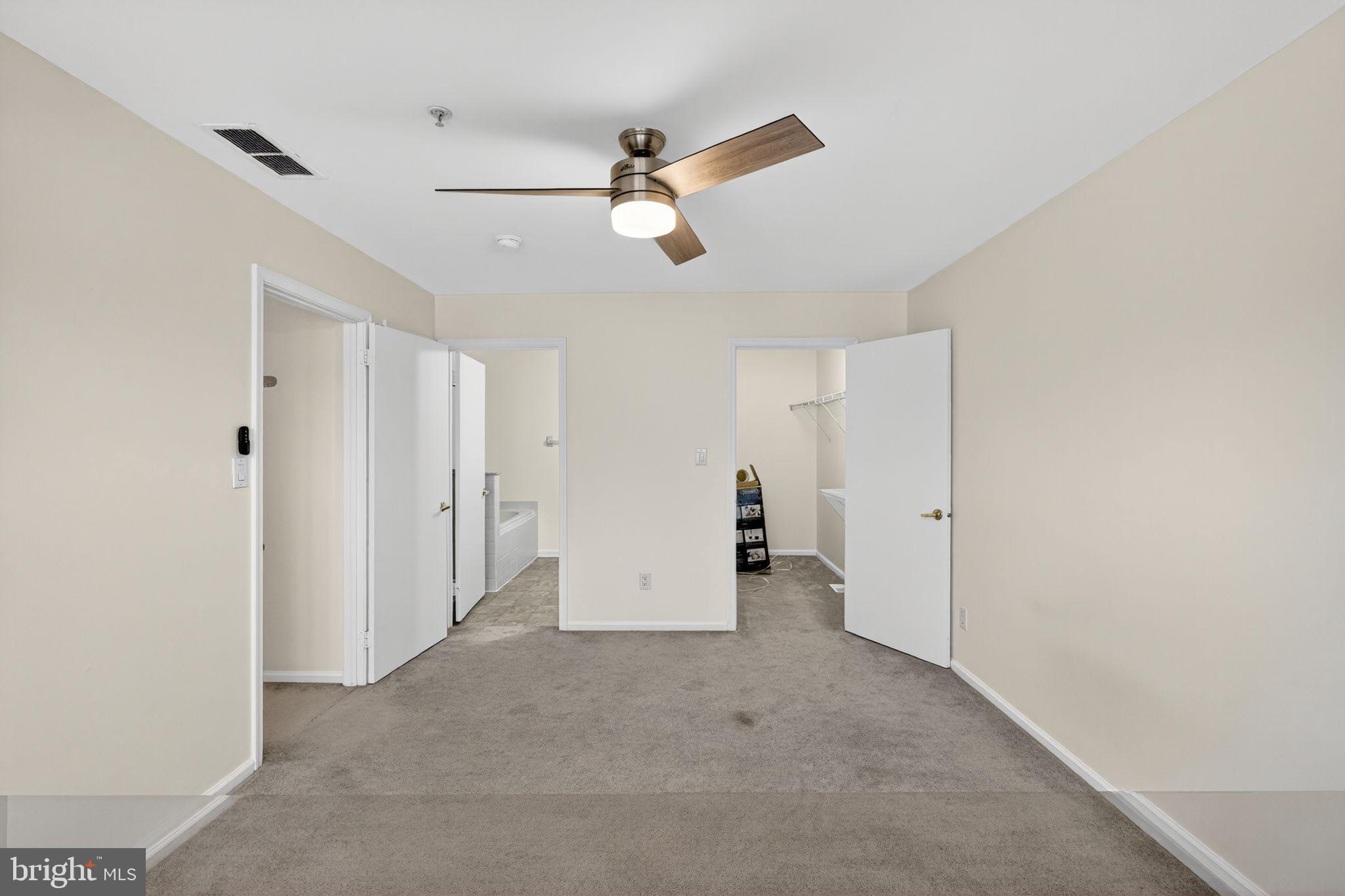 1404 Wharton Road Mount Laurel, NJ 08054 - Photo 25 of 30 a view of an empty room with a ceiling fan