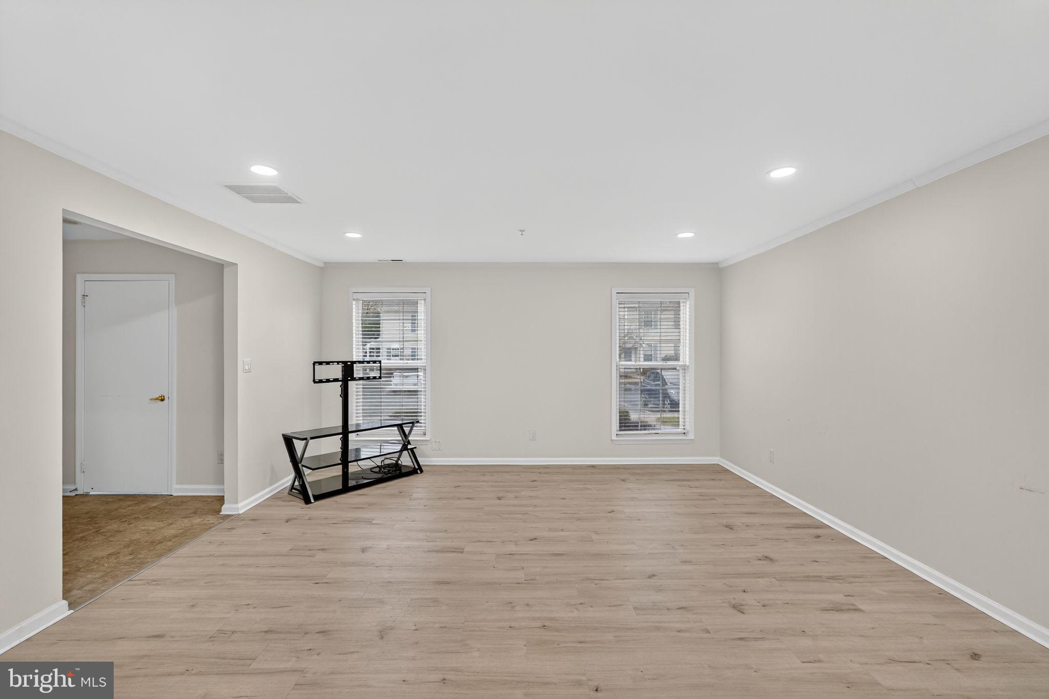 1404 Wharton Road Mount Laurel, NJ 08054 - Photo 3 of 30 a view of a room with wooden floor