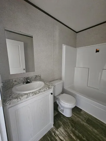 a view of a lake with a city