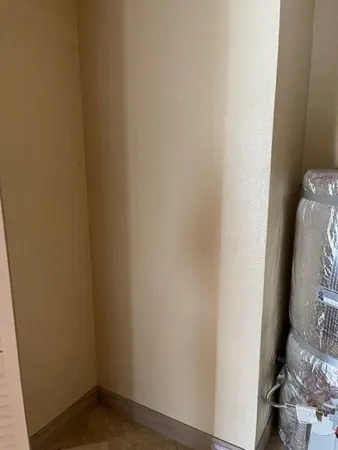 an empty room with a door