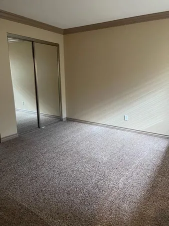 an empty room with closet