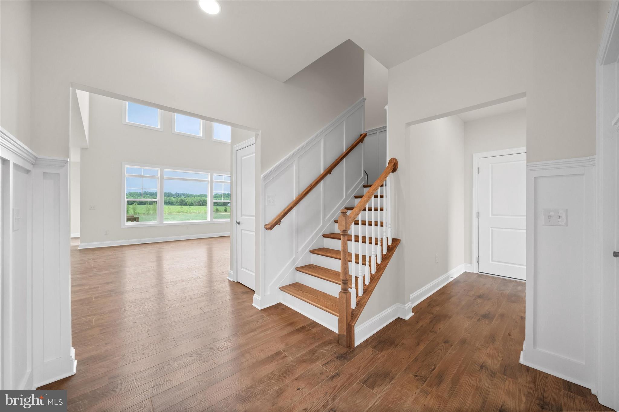24025 Jerrico Road, Unit 38 Lincoln, DE 19960 - Photo 16 of 53 a view of entryway with wooden floor and window