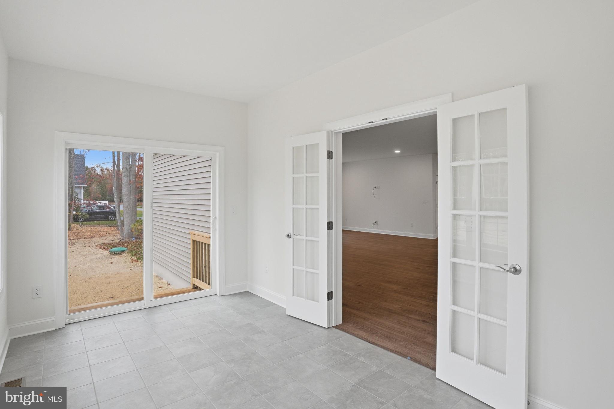 24025 Jerrico Road, Unit 38 Lincoln, DE 19960 - Photo 25 of 32 wooden floor and closet in a room