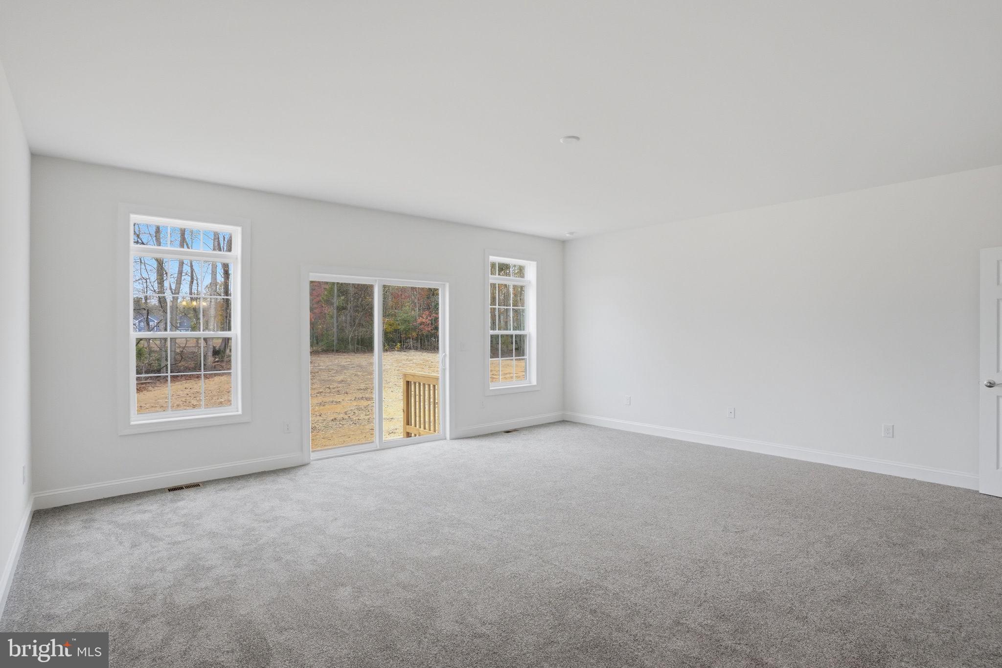 24025 Jerrico Road, Unit 38 Lincoln, DE 19960 - Photo 27 of 32 an empty room with a window