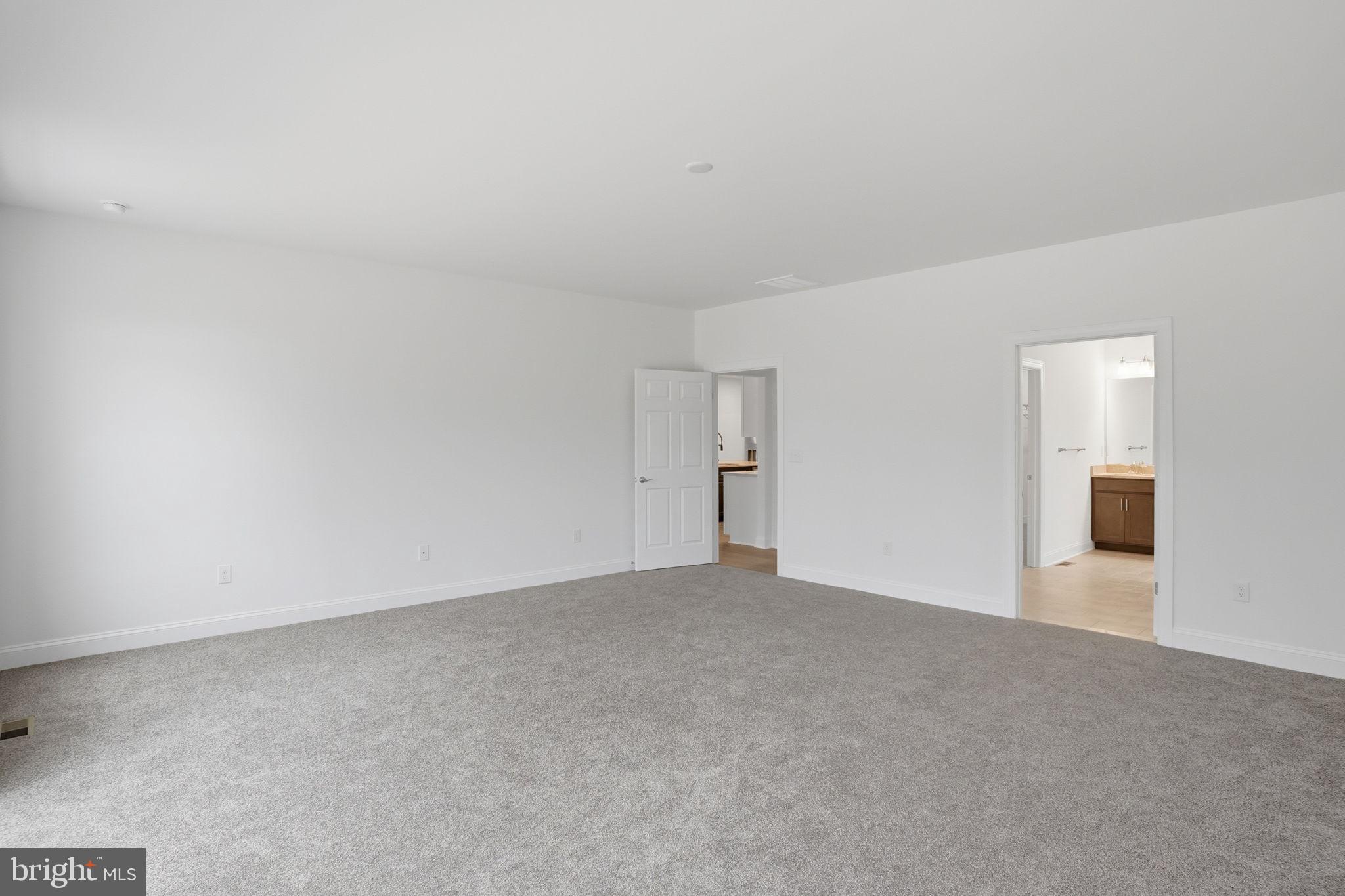 24025 Jerrico Road, Unit 38 Lincoln, DE 19960 - Photo 28 of 32 a view of an empty room with chandelier