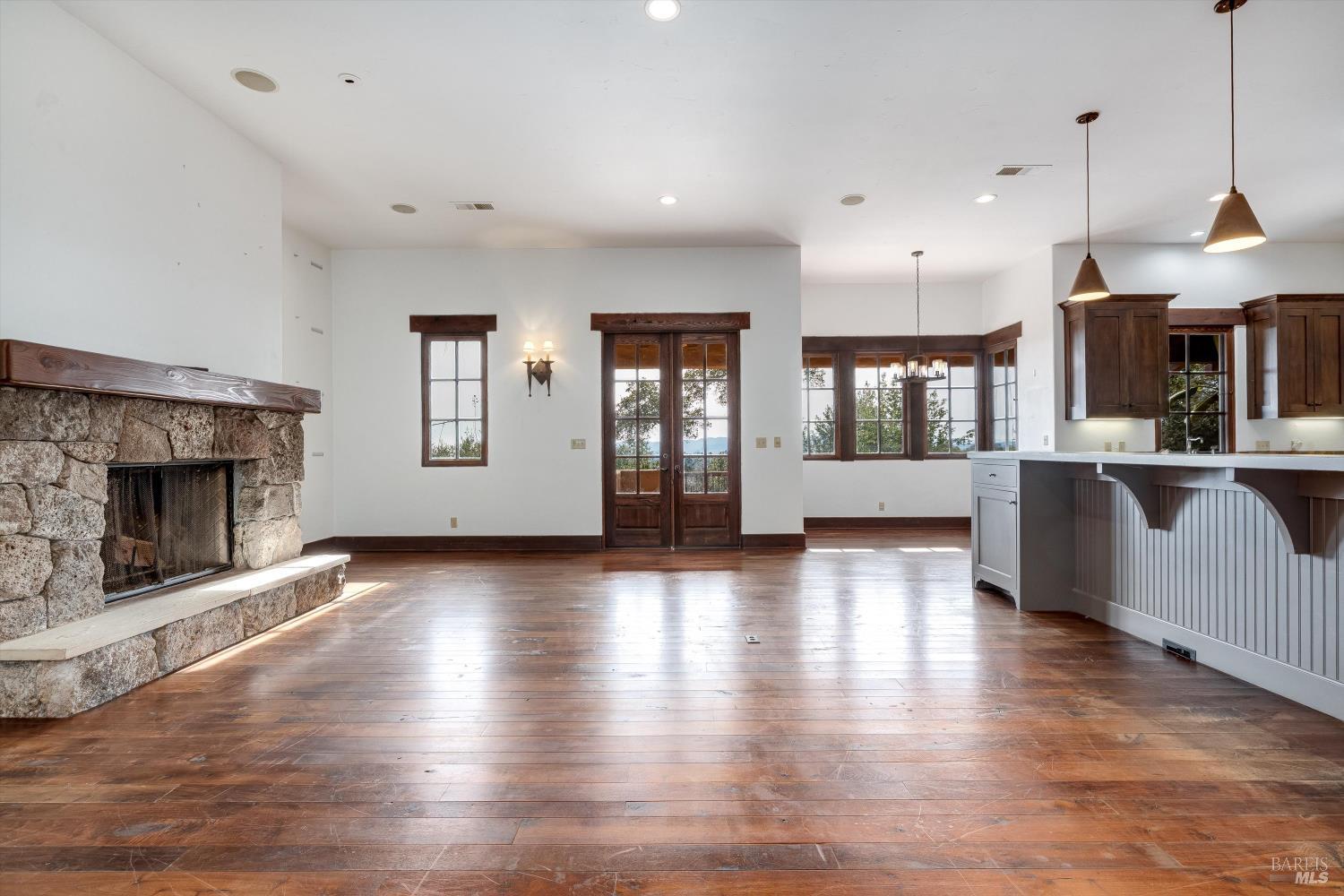 969 Rachael Road Sonoma, CA 95476 - Photo 16 of 81 a view of a big room with wooden floor and a kitchen