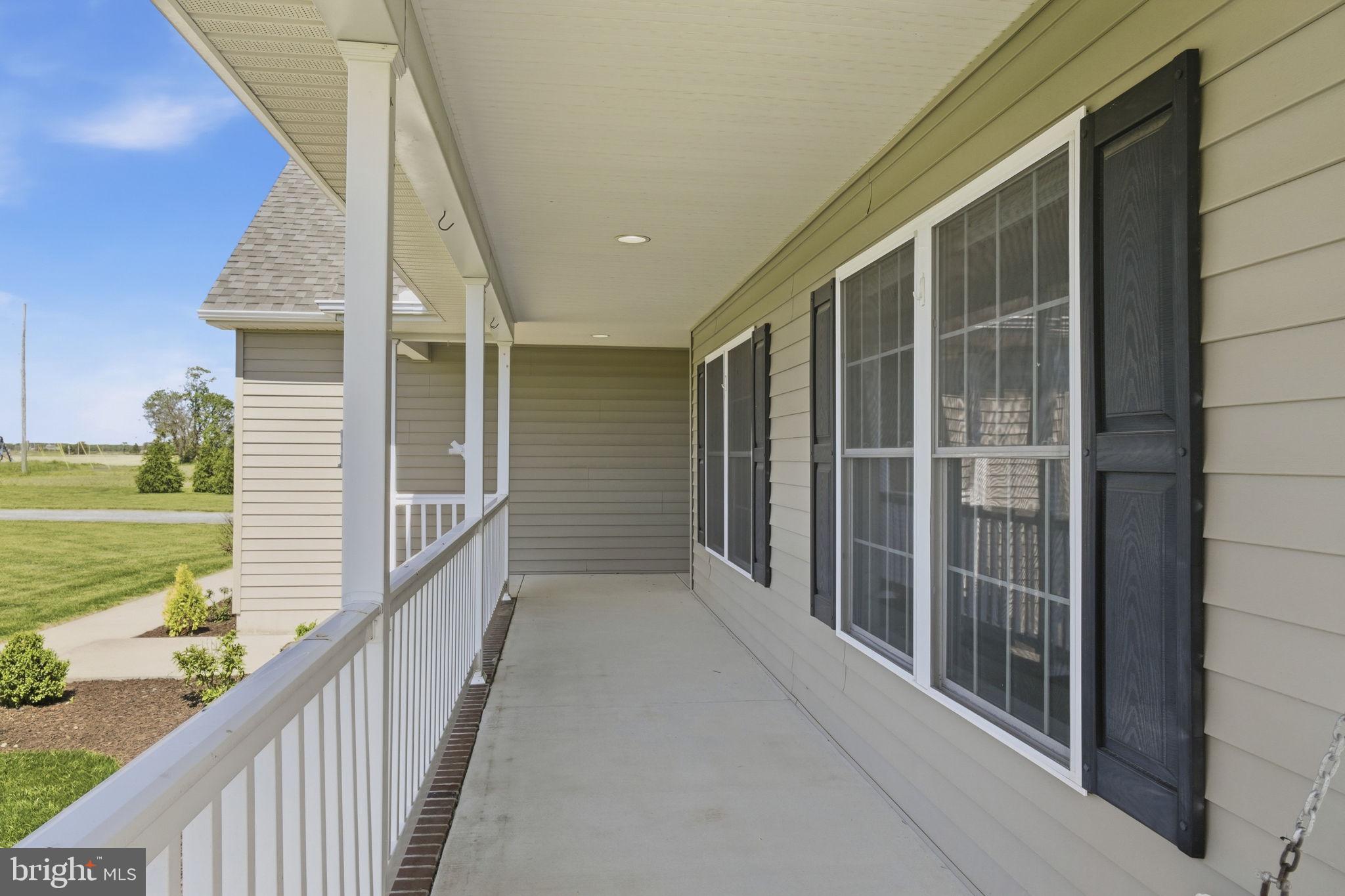 615 Ell Downes Road Henderson, MD 21640 - Photo 38 of 58 Charming porch with inviting views.