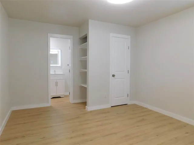 a bathroom with a sink and mirror